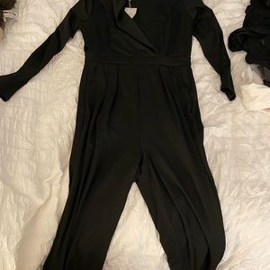 Black never worn jumpsuit size 4
